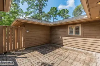608 Camellia Lane, Sunset Beach, NC 28468 – photo 6: Courtyard 1B