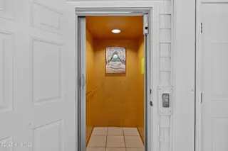 3617 W Pelican Drive, Oak Island, NC 28465 – photo 23: 67_elevator