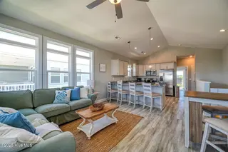 128 Sea Gull Lane, North Topsail Beach, NC 28460 – photo 7: living room and kitchen