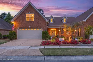 8266 Stenton Drive NE, Leland, NC 28451 — 3-bedroom townhome in Compass Pointe, Leland, NC, photo 1 of 58: 50-IMG_6027_twilight_0398c22b-Edit