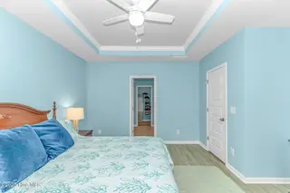 8960 Smithfield Drive NW, Calabash, NC 28467 – photo 16: Primary bedroom