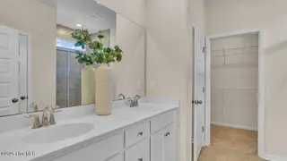 8667 Baton Rouge Avenue NW, Calabash, NC 28467 – photo 11: crs_1946_pic_stphillips_owners_bath_2of3