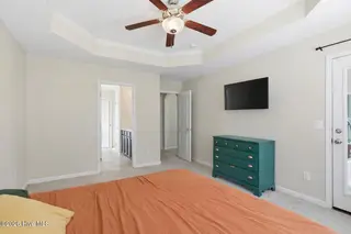 404 Hidden Oaks Drive, Jacksonville, NC 28546 – photo 16: Cozy bedroom with modern accents