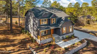 101 Douglas Drive, West End, NC 27376 – photo 5: 4-web-or-mls-DJI_20251215114206_0311_D