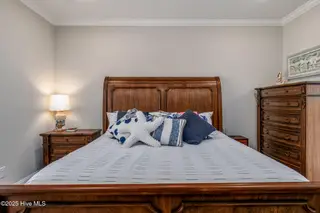 180 Boundaryline Drive NW, Calabash, NC 28467 – photo 20: Master Bedroom