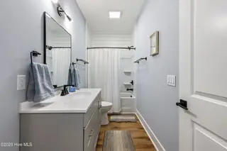 119 NE 27th Street, Oak Island, NC 28465 – photo 15: hall bath