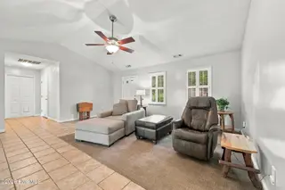 107 Fodder Drive, Hubert, NC 28539 — 3-bedroom home in Ole Mill Village, Hubert, NC, photo 12 of 59: 12_Living_Room_Toward_Patio