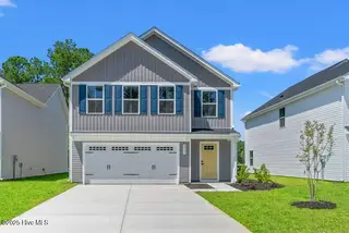 8031 Sterling Oaks Drive NW, Ash, NC 28420 – photo 1: Marigold QMI