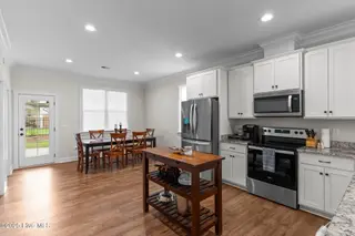162 NW 9th Street, Oak Island, NC 28465 – photo 11: kitchen dining 2