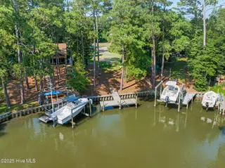 117 White Ash Drive, Pine Knoll Shores, NC 28512 – photo 6: Dock at end of canal
