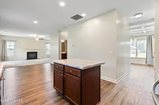 317 James Hedrick Court, Jacksonville, NC 28540 – photo 15: island into dining