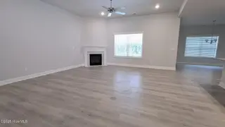511 Sweet Potato Lane Lot 10, Nashville, NC 27856 – photo 13: family room with floor outlet