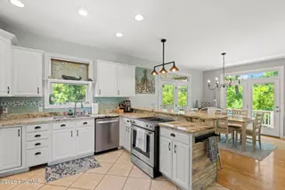 9804 Heath Place, Emerald Isle, NC 28594 – photo 11: Kitchen:Din Rm 2nd floor