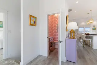 109 Coral Bay Court, Atlantic Beach, NC 28512 – photo 24: Half Bath Near Kitchen