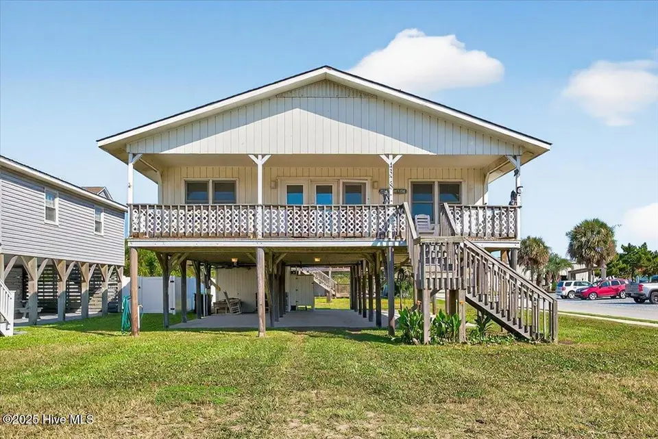 4328 E Dolphin Drive, Oak Island, NC 28465 – photo 1 of 53: Front