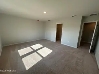 564 Coronado Avenue SE 15, Leland, NC 28451 – photo 13: Owner's Bedroom