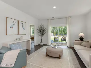 2182 Sweetspire Street Unit 2020, Leland, NC 28451 – photo 13: Sliders to Back Covered Porch