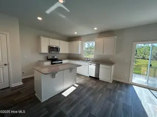 564 Coronado Avenue SE 15, Leland, NC 28451 – photo 6: Kitchen & Dining Area