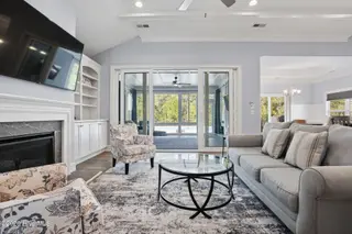 6476 Bryson Drive SW, Ocean Isle Beach, NC 28469 – photo 10: Double sliders to Carolina room