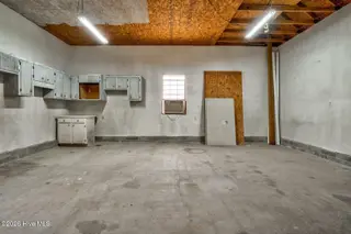6574 Leigh Road, Rocky Mount, NC 27803 — 3-bedroom home in Williams Farm, Rocky Mount, NC, photo 6 of 30: Detached Garage Interior