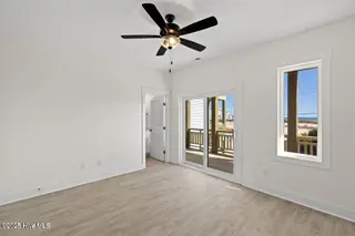 126 Shell Road, Surf City, NC 28445 – photo 16: 126 primary bedroom