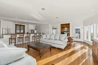 3107 Ocean Drive, Emerald Isle, NC 28594 – photo 16: Open living room w/ fireplace
