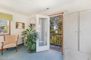 104 Elm Court, Pine Knoll Shores, NC 28512 – photo 18: Primary Bedroom Balcony
