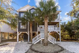 1617 E Pelican Drive, Oak Island, NC 28465 – photo 1: 1617 E. Pelican