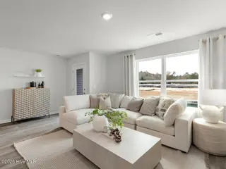 8189 Foxglove Lane Unit 90, Leland, NC 28451 — 3-bedroom townhome in SeaBrooke, Leland, NC, photo 15 of 42: similar to family room