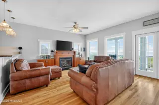 1106 Fort Fisher Boulevard N Unit 1, Kure Beach, NC 28449 – photo 21: 19 - Living Room