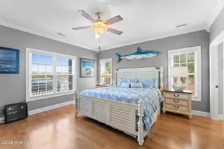 1404 W Yacht Drive, Oak Island, NC 28465 – photo 12: Primary bedroom