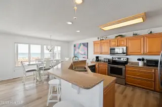 1123 E Beach Drive, Oak Island, NC 28465 – photo 13: mls-RIC_4671