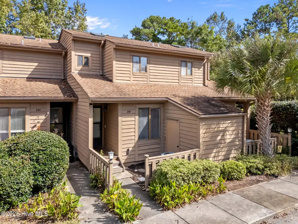 231 Saint Luke Court, Wilmington, NC 28409 — 2-bedroom waterfront townhome in Caneel Cove, Wilmington, NC, photo 1 of 38: 2-web-or-mls-DJI_20251002111852_0389_D