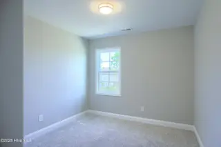218 Sandpiper Place, Holly Ridge, NC 28445 – photo 21: 218 Sand Piper - Exterior - Edited_7