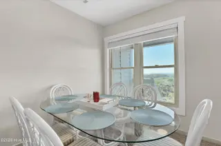 2105 Ocean Boulevard B, Topsail Beach, NC 28445 — 2-bedroom condo in Serenity Point, Topsail Beach, NC, photo 20 of 36: Dining Area