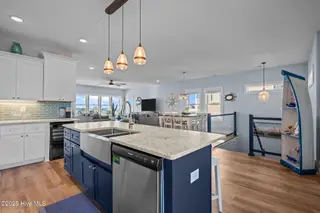 3504 E Beach Drive, Oak Island, NC 28465 – photo 13: 45-web-or-mls-DSC04278