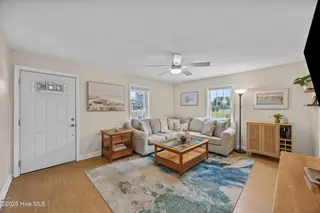 141 Hargrove Drive, Wilmington, NC 28411 — 2-bedroom home in Weaver Acres, Wilmington, NC, photo 6 of 32: 10_living room