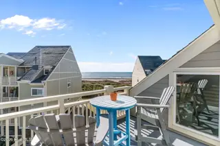 1000 Caswell Beach Road Apt. 806, Oak Island, NC 28465 — 2-bedroom condo in Oak Island Bch Villa, Oak Island, NC, photo 7 of 56: Ocean View from Open Balcony
