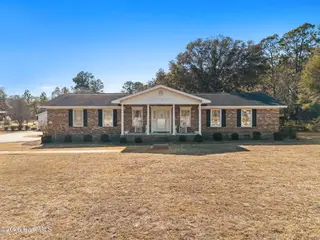 2639 Stone Chimney Road SW, Supply, NC 28462 – photo 1: 2639 Stone Chimney Rd SW