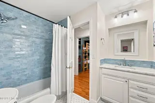 123 Willis Drive, Harkers Island, NC 28531 — 2-bedroom home, Harkers Island, NC, photo 22 of 34: Hall Bathroom