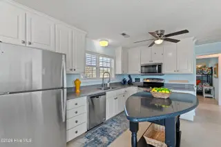 316 E Dolphin Drive, Oak Island, NC 28465 – photo 5: 316EDolphinDr - 21