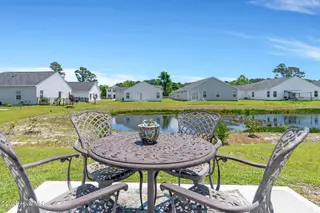 4901 Abbington Oaks Way SE, Southport, NC 28461 — 3-bedroom home in Groves at Southport, Southport, NC, photo 23 of 31: Patio