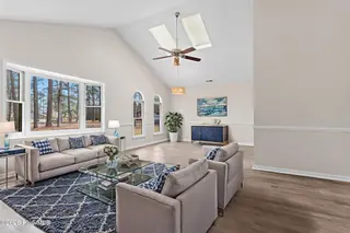 42 Pinewood Drive, Carolina Shores, NC 28467 – photo 11: Living Room Virtually Staged