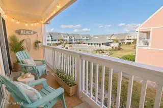 9201 Coast Guard Road F 210, Emerald Isle, NC 28594 – photo 18: Covered deck staged