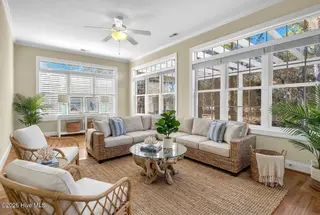 8724 Sedgley Drive, Wilmington, NC 28412 – photo 17: Virtually Staged Sunroom
