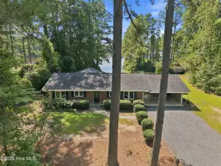 117 Lakeview Drive, Whispering Pines, NC 28327 – photo 6: 6-web-or-mls-DJI_20260908113217_0274_D