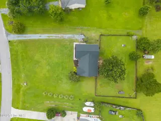 313 Oakmont Drive, Hampstead, NC 28443 – photo 5: 5-web-or-mls-DJI_20250811101212_0194_D