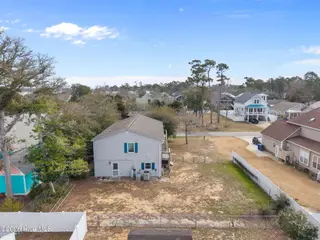 321 NE 59th Street, Oak Island, NC 28465 – photo 8: 5-web-or-mls-DJI_20260303105350_0825_D