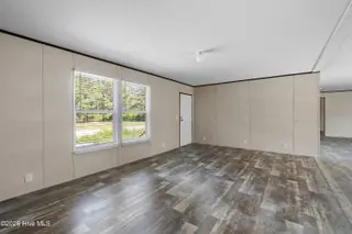 490 Orchard Lane SE, Bolivia, NC 28422 — 3-bedroom manufactured home in Vineyard Plantation, Bolivia, NC, photo 8 of 27: Living room
