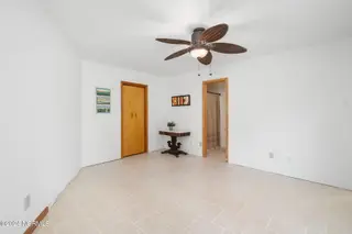 335 Country Club Lane, Newport, NC 28570 – photo 16: First floor primary bedroom suite